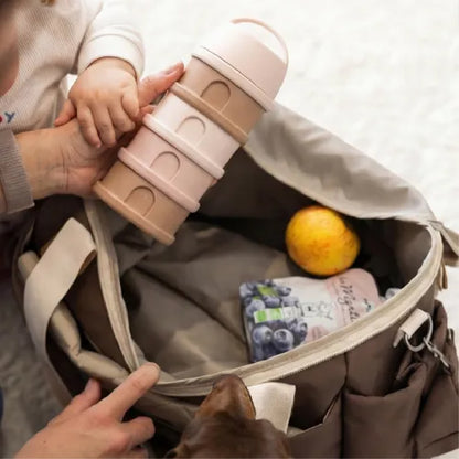 Sac à langer avec biberon empilable rose, fruit et collations pour maman et bébé